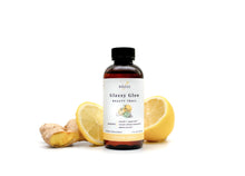 Load image into Gallery viewer, Glassy Glow Ginger Lemon Bottle with Flavor Ingredients